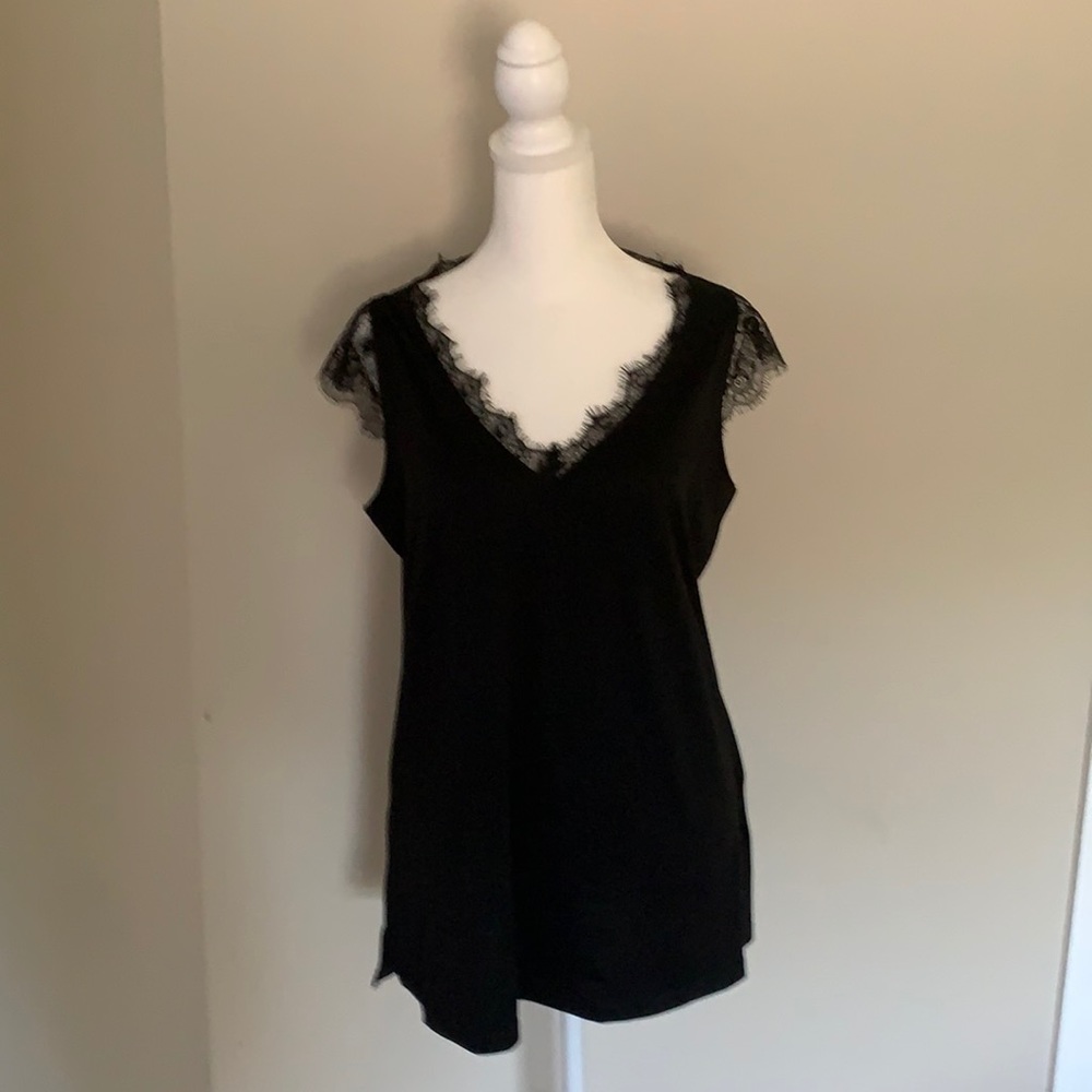NWOT black shirt size Medium.